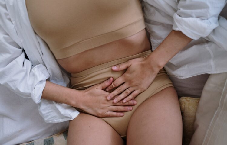 Woman Suffering from a Stomach Pain