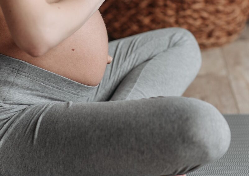A Pregnant Woman Meditating